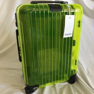 Green Rimowa carry on suitcase limited edition